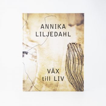 Insektsliknande konst på belyst bakgrund