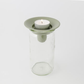 Våges ljushållare för glasburk.